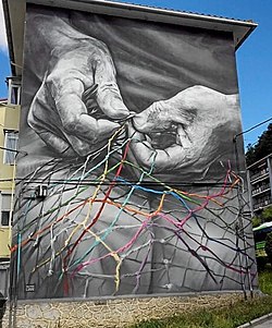 Foto del mural "the hands of many"