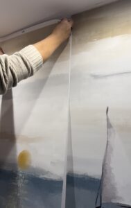 Colocación de una tira de papel pintado